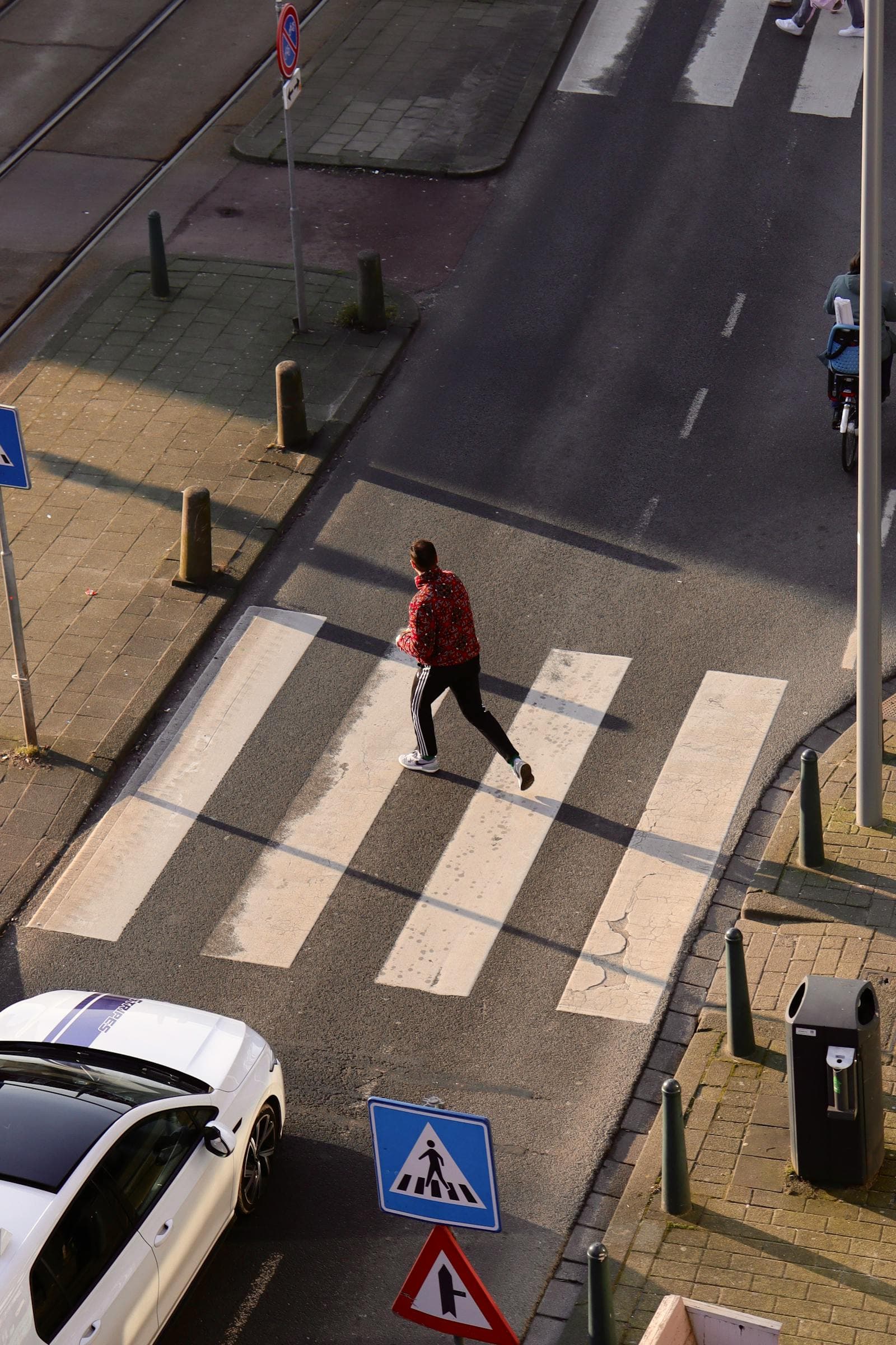 Person crossing a city street