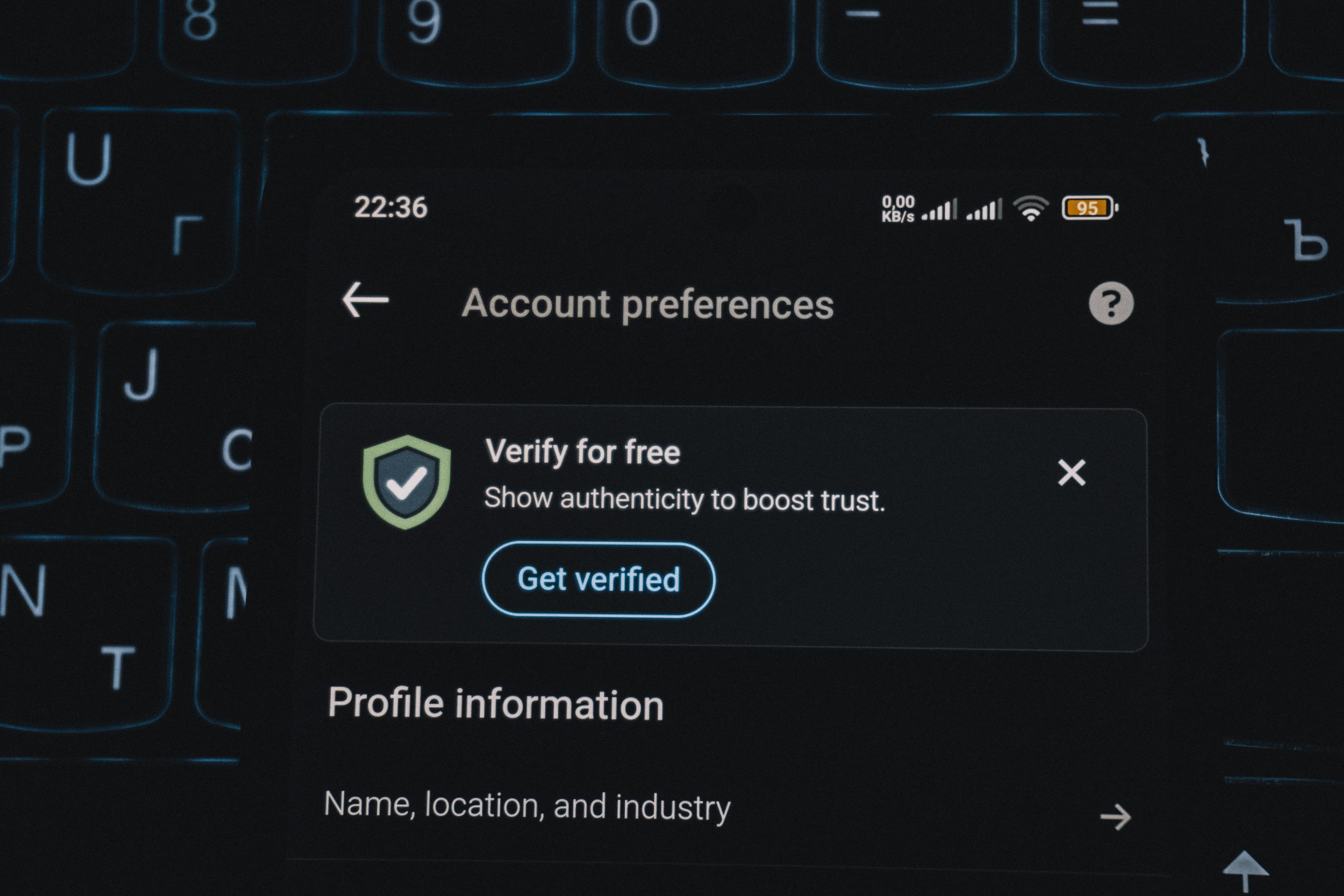 Phone screen showing an account verification alert